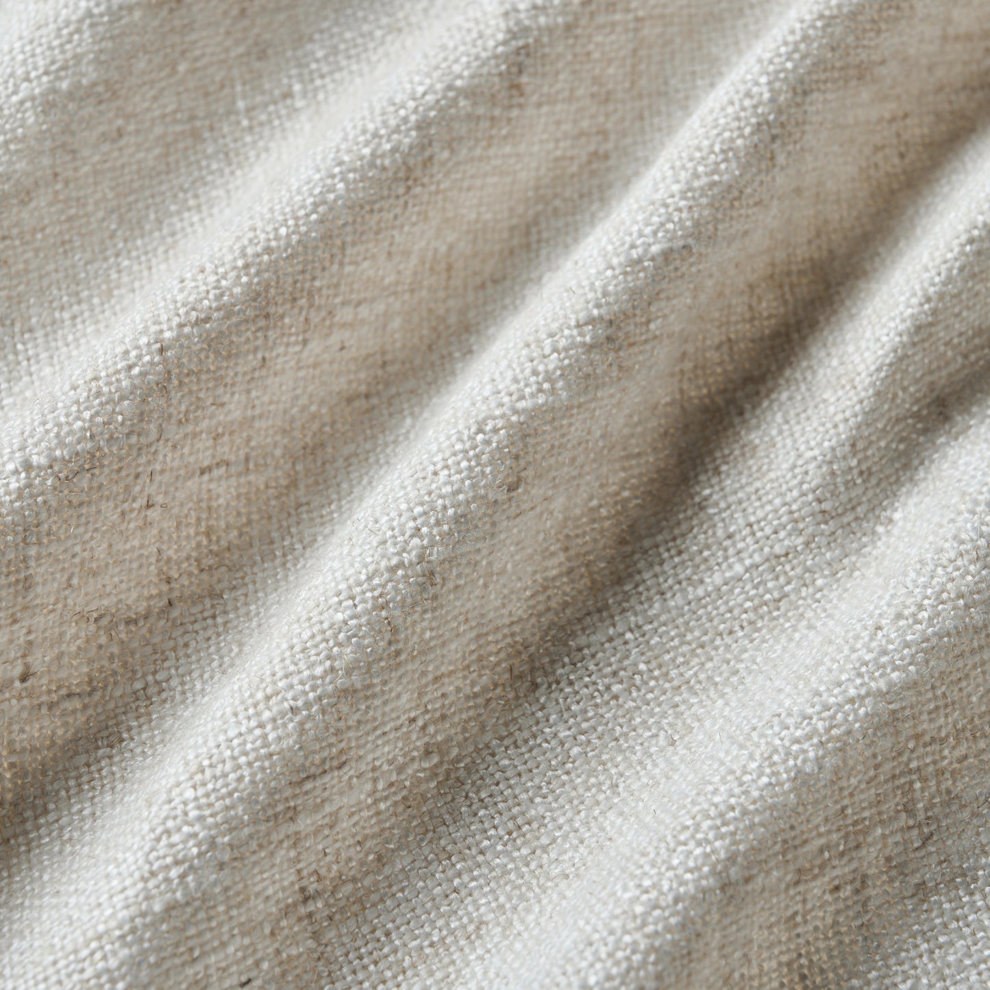 Oatmeal poly-viscose-linen blend curtain detail showing fabric texture.