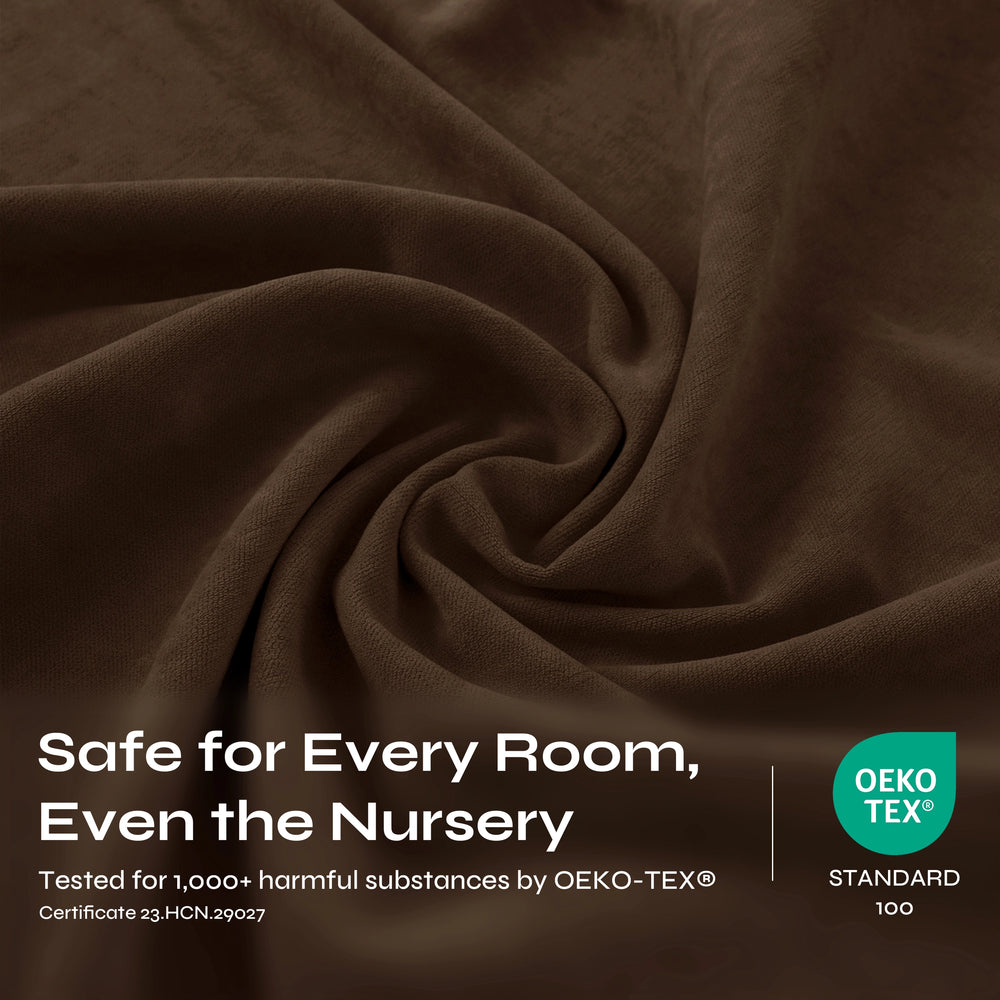 A close-up of draped brown fabric with a soft, slightly textured surface.