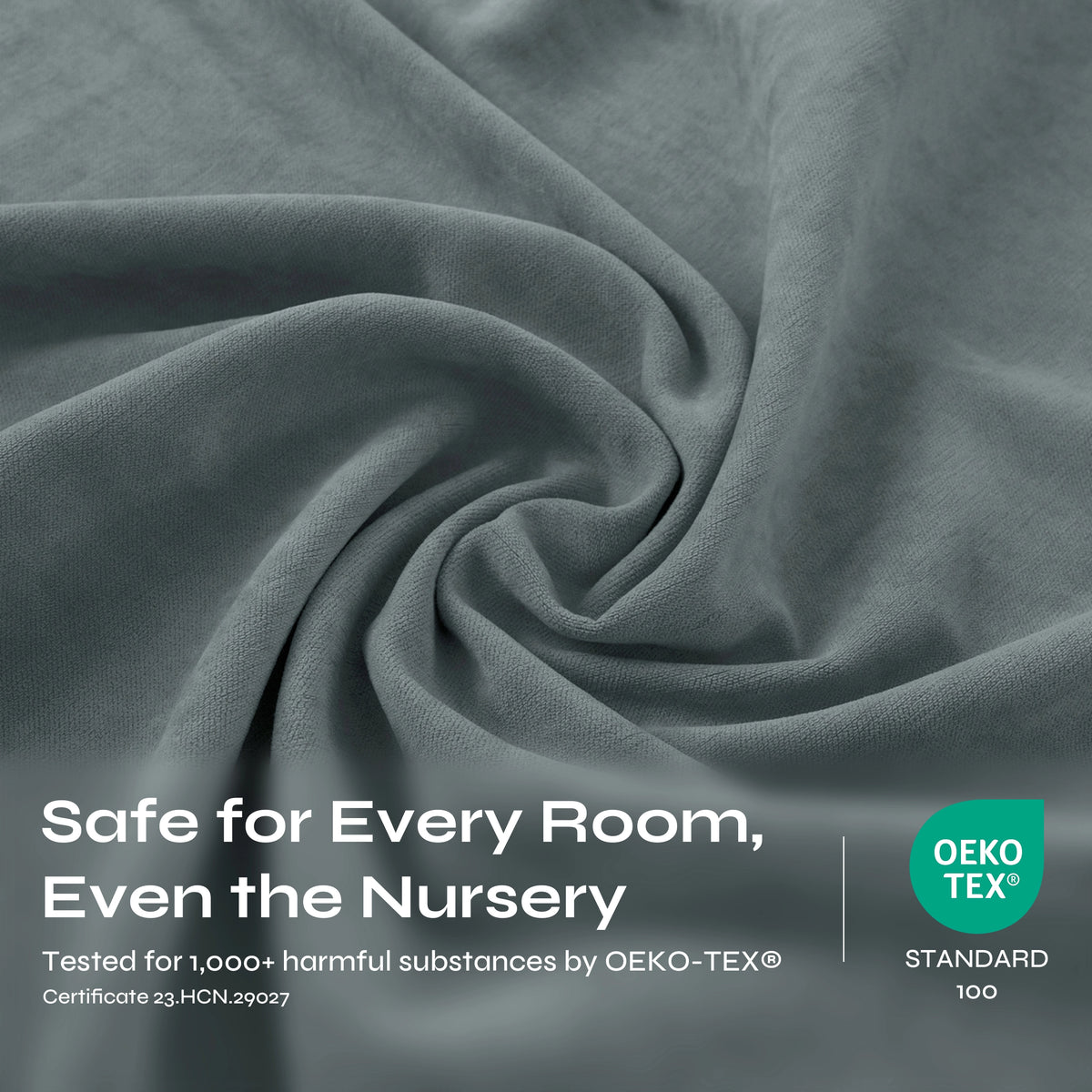 A close-up of draped dusty blue-gray fabric with a soft, textured weave.