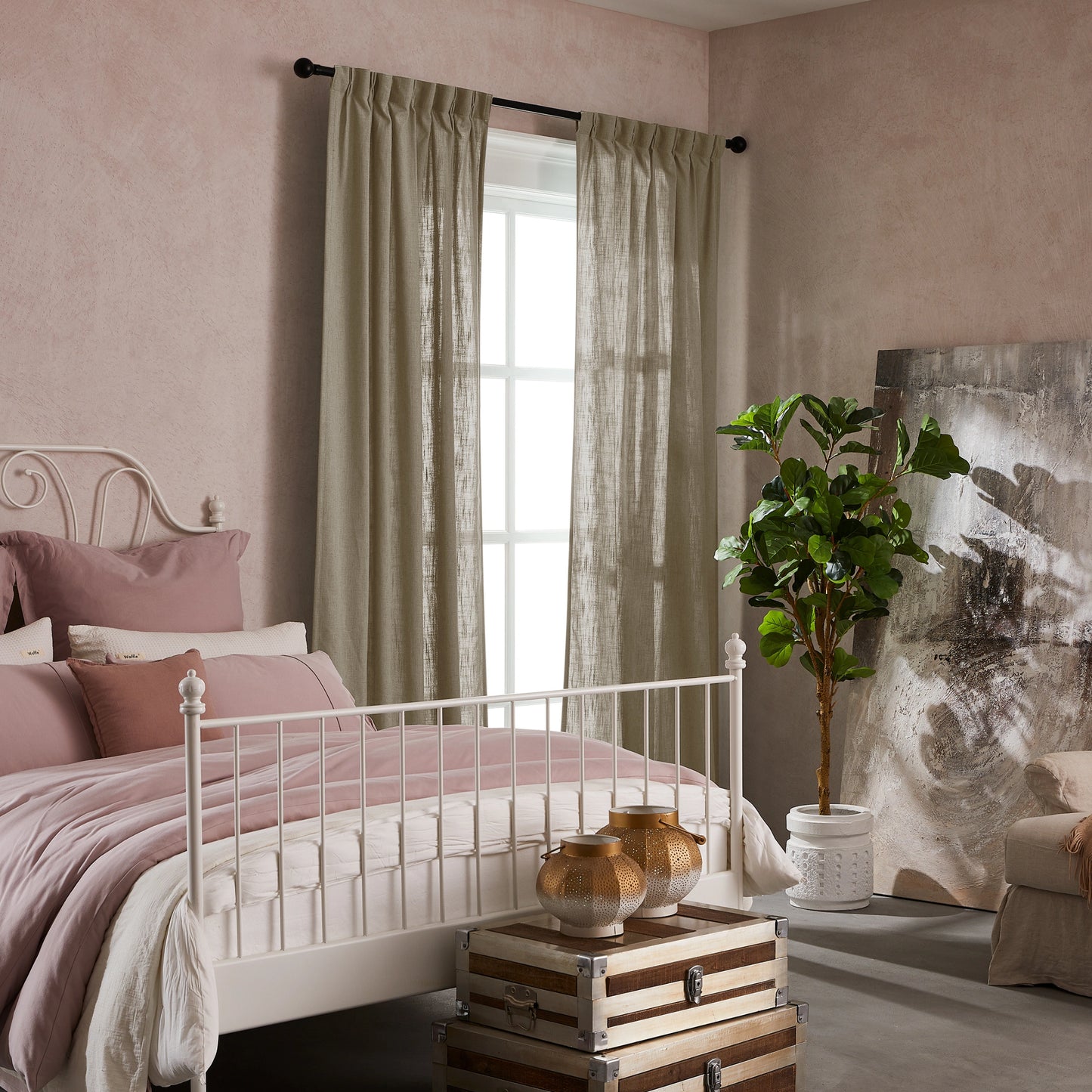 Bedroom with pink walls, white bed, decorative elements, and elegant soft camel linen-polyester mix pleated curtains.