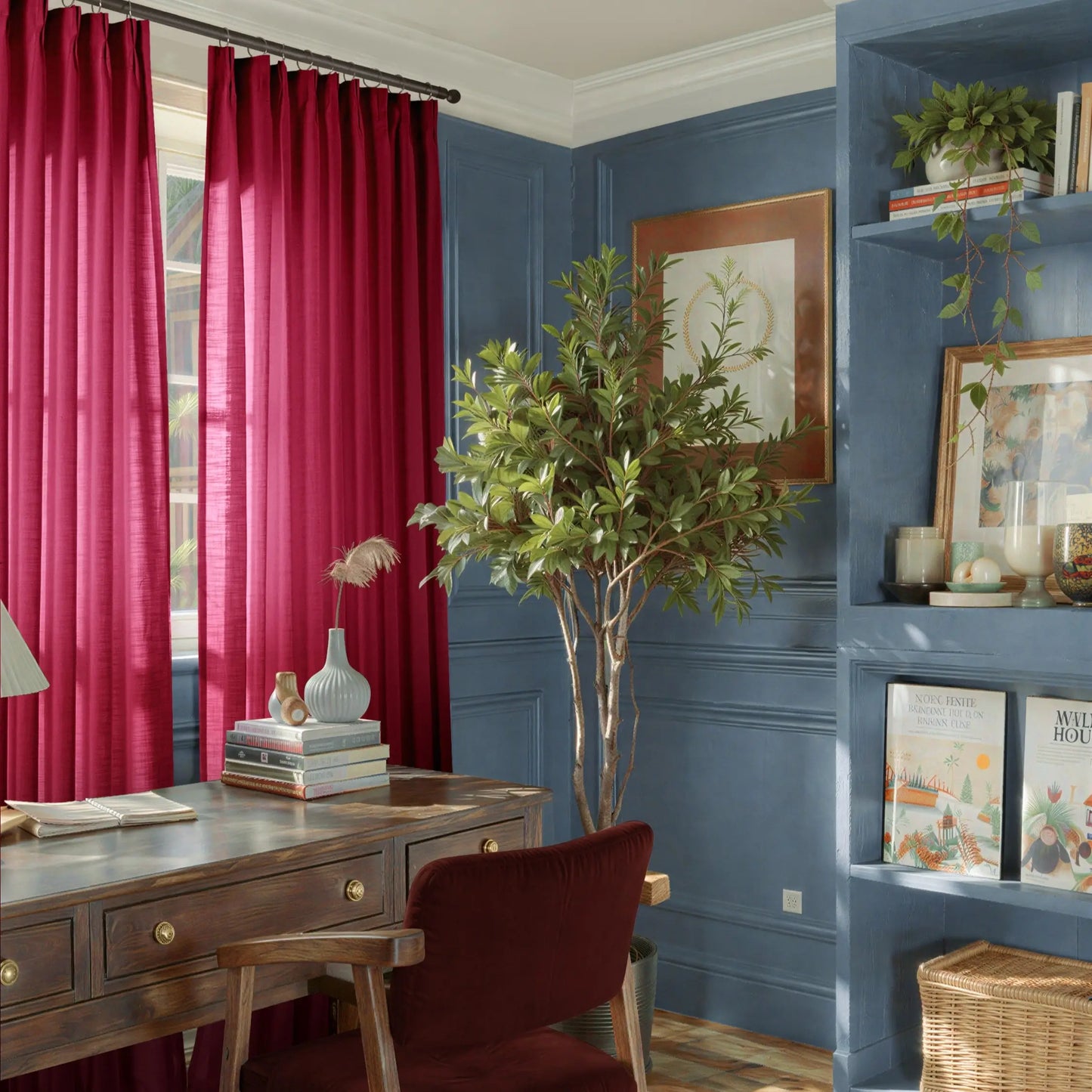 Home office with red curtains, wooden desk, and bookshelf.