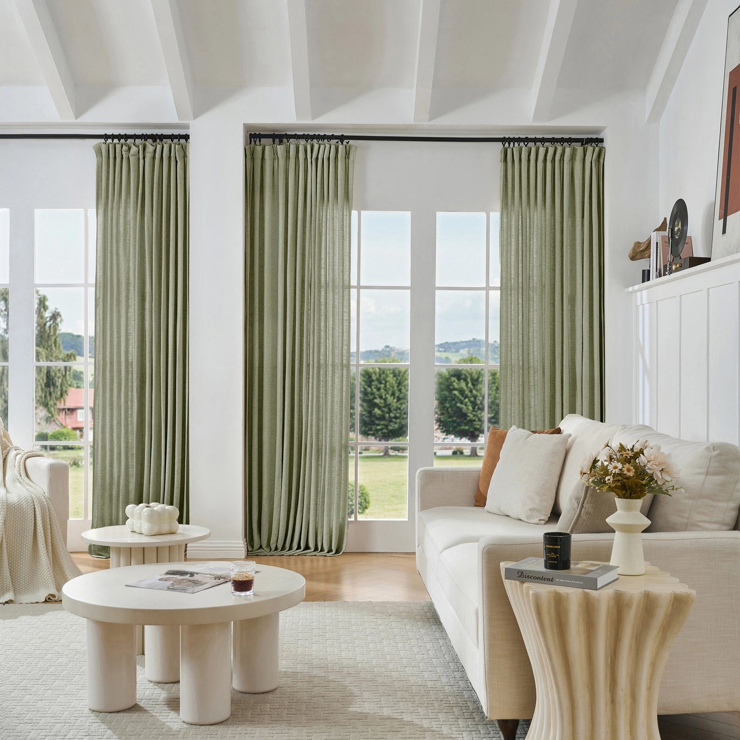 Modern living room with charcoal gray viscose, polyester, and linen mixed fabric, a white sofa, and decorative accents.