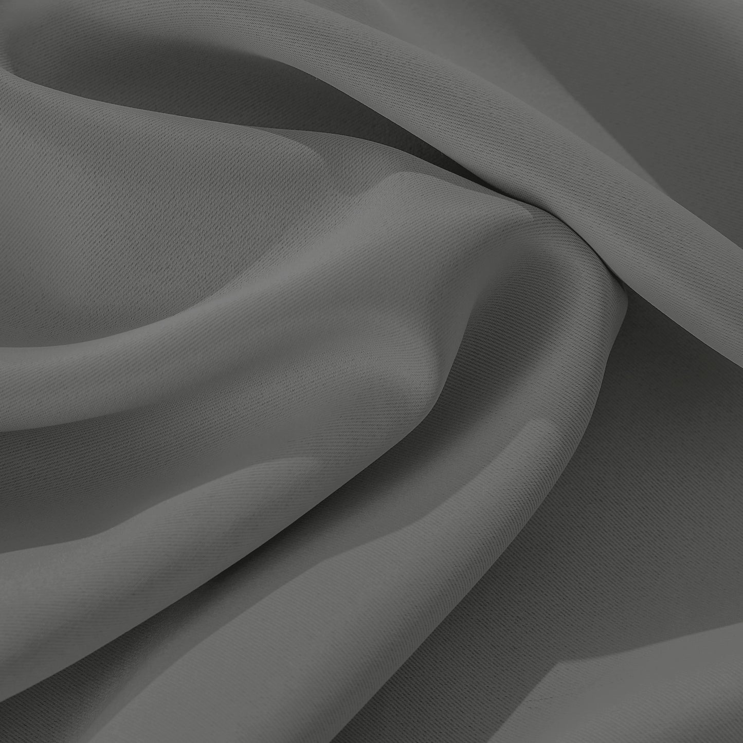 Close-up of flame-retardant urban graycurtain fabric, soft textured thermal insulated material