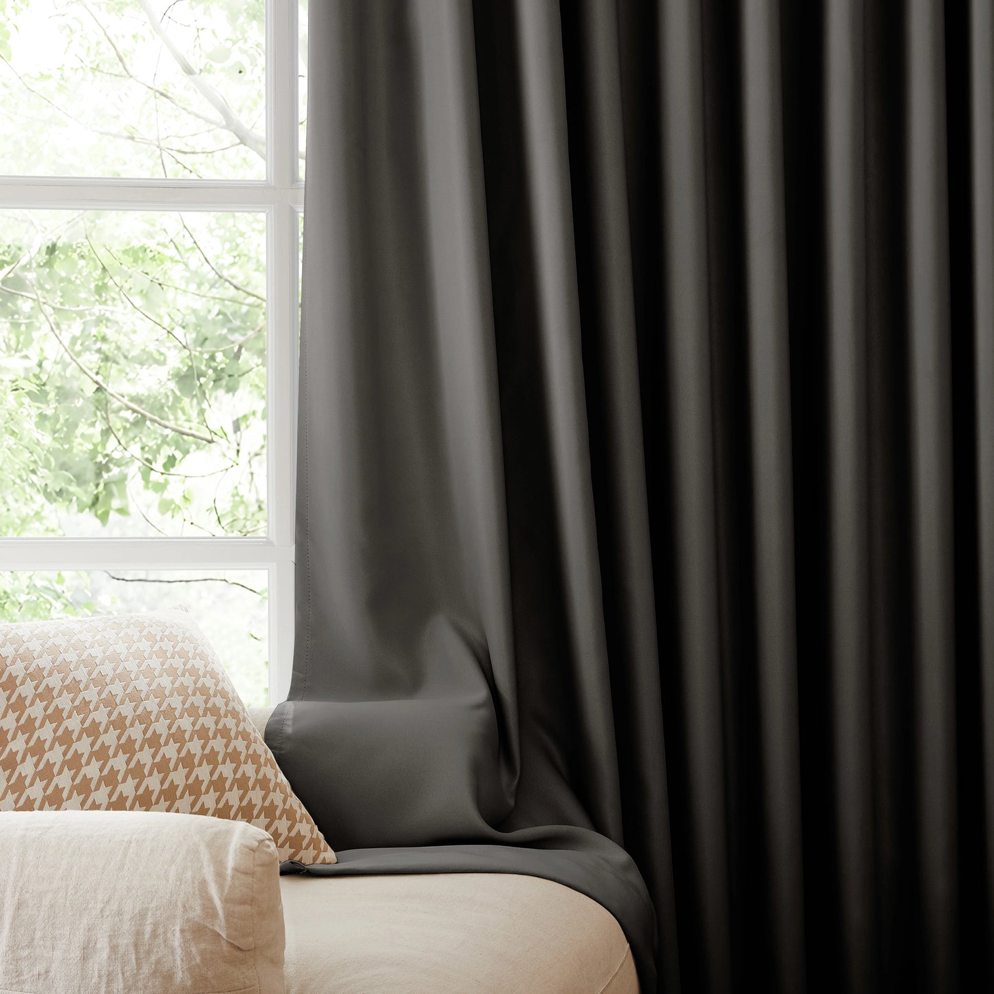 Fire retardant classic gray blackout curtains, room darkening window panels behind sofa area