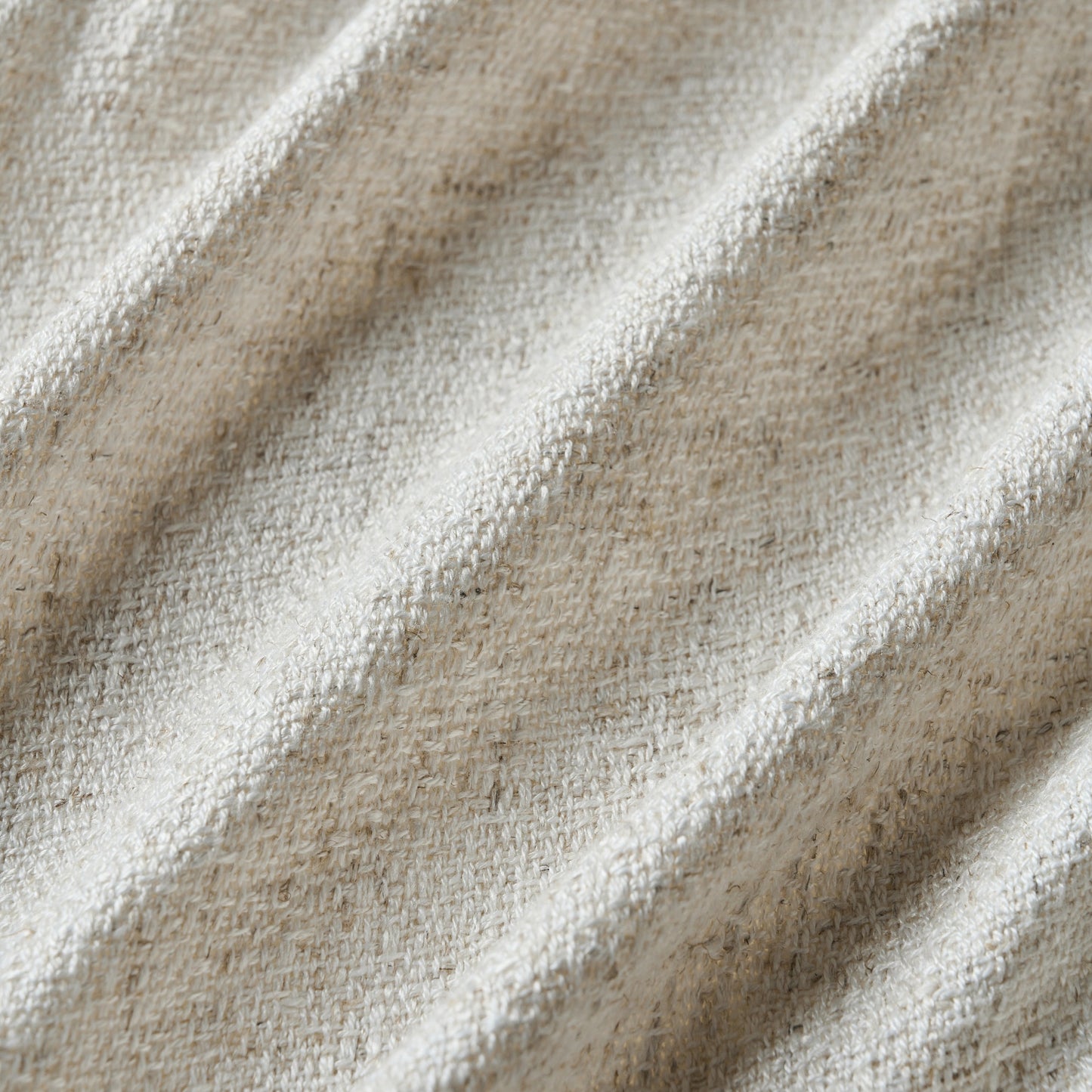 Eggshell curtain detail in viscose-polyester-linen blend with soft, natural woven texture, ideal for curtains or décor.