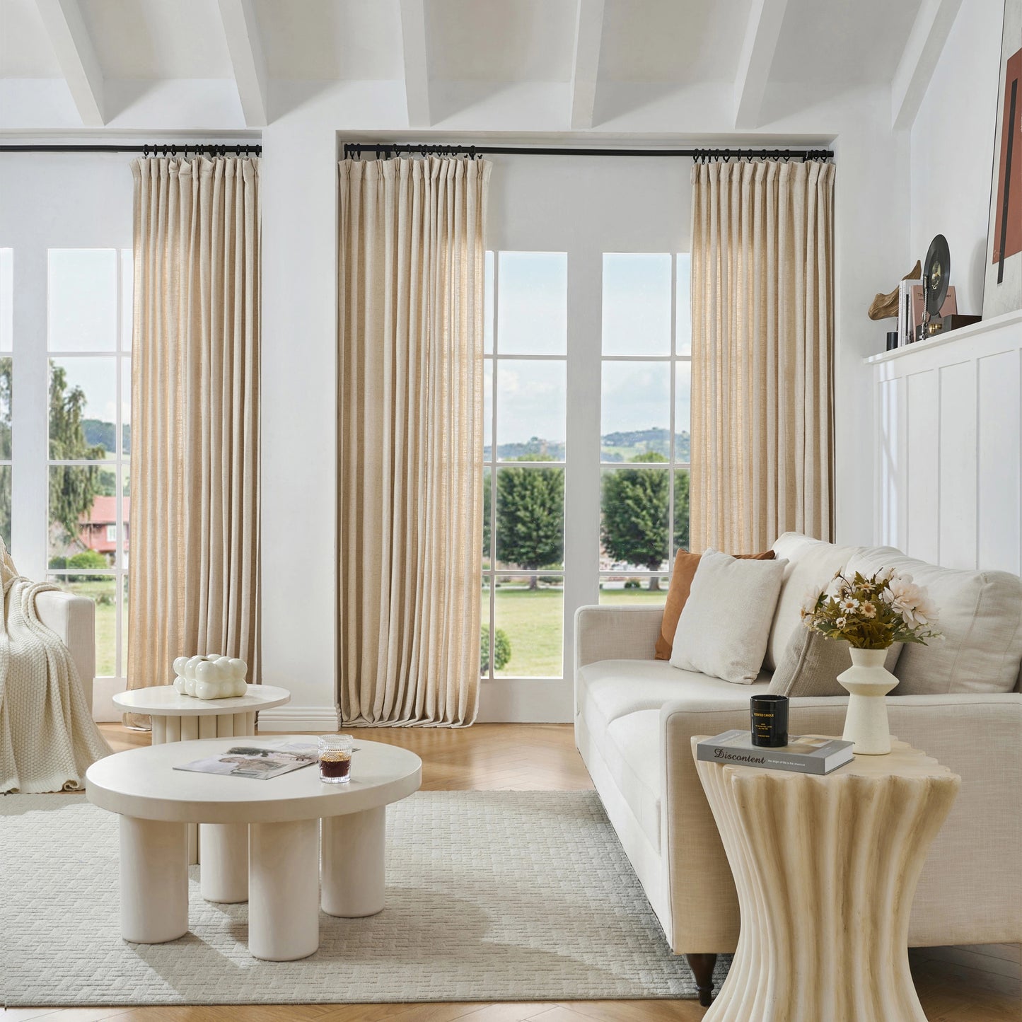 Modern living room with cream viscose, polyester, and linen mixed fabric, a white sofa, and decorative accents.