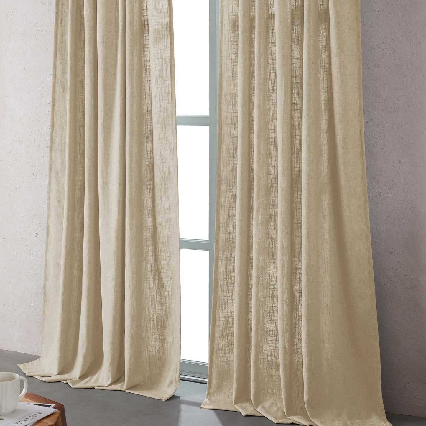Khaki-toned linen-polyester blend curtains hanging in front of a window with a neutral background.
