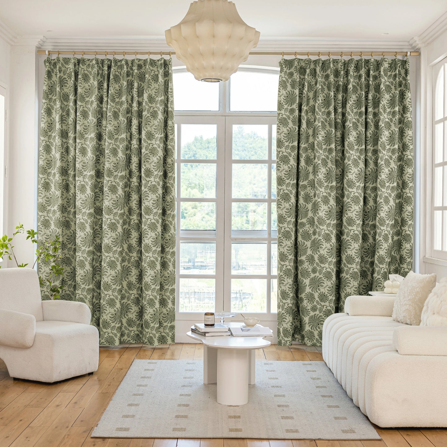 Leaf patterned curtains creating a calm and natural living room atmosphere