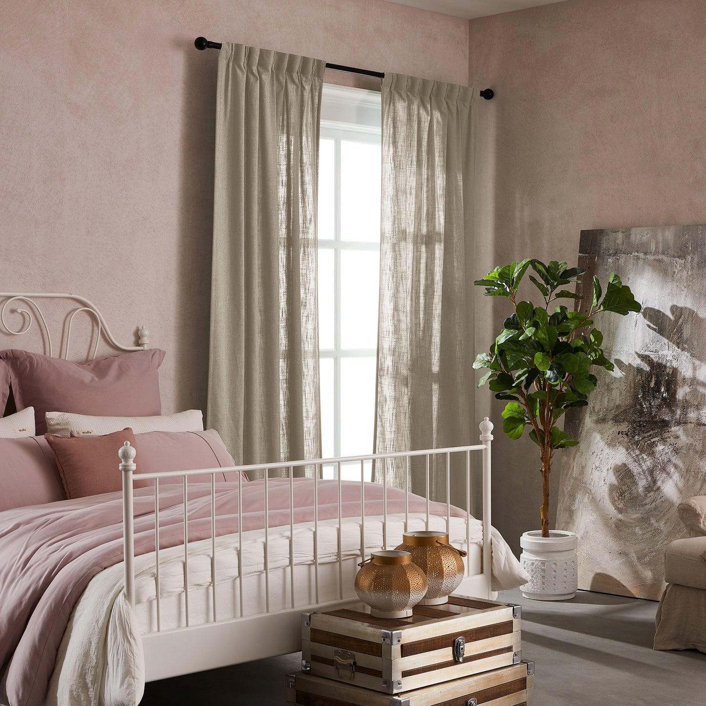 Bedroom with pink walls, white bed, decorative elements, and elegant soft light camel linen-polyester mix pleated curtains.