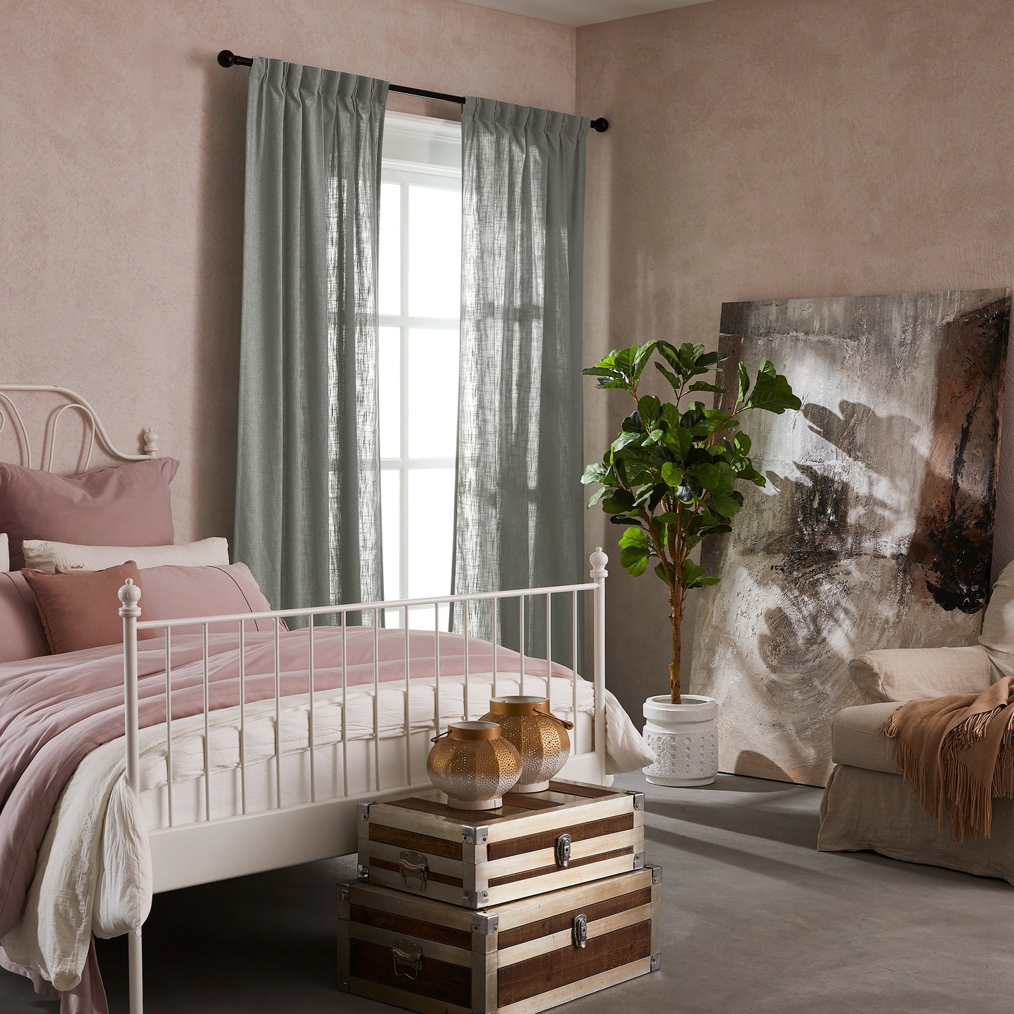 Bedroom with pink walls, white bed, decorative elements, and elegant soft light gray linen-polyester mix pleated curtains.