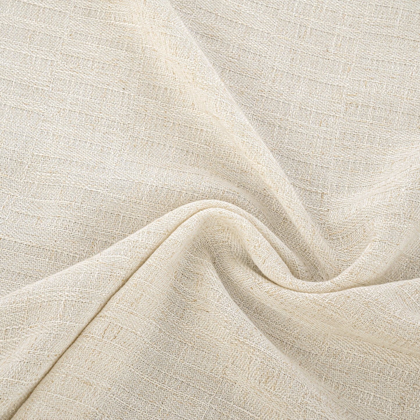 Close up of linen fabric showing elongated grid texture with a vertical structured weave