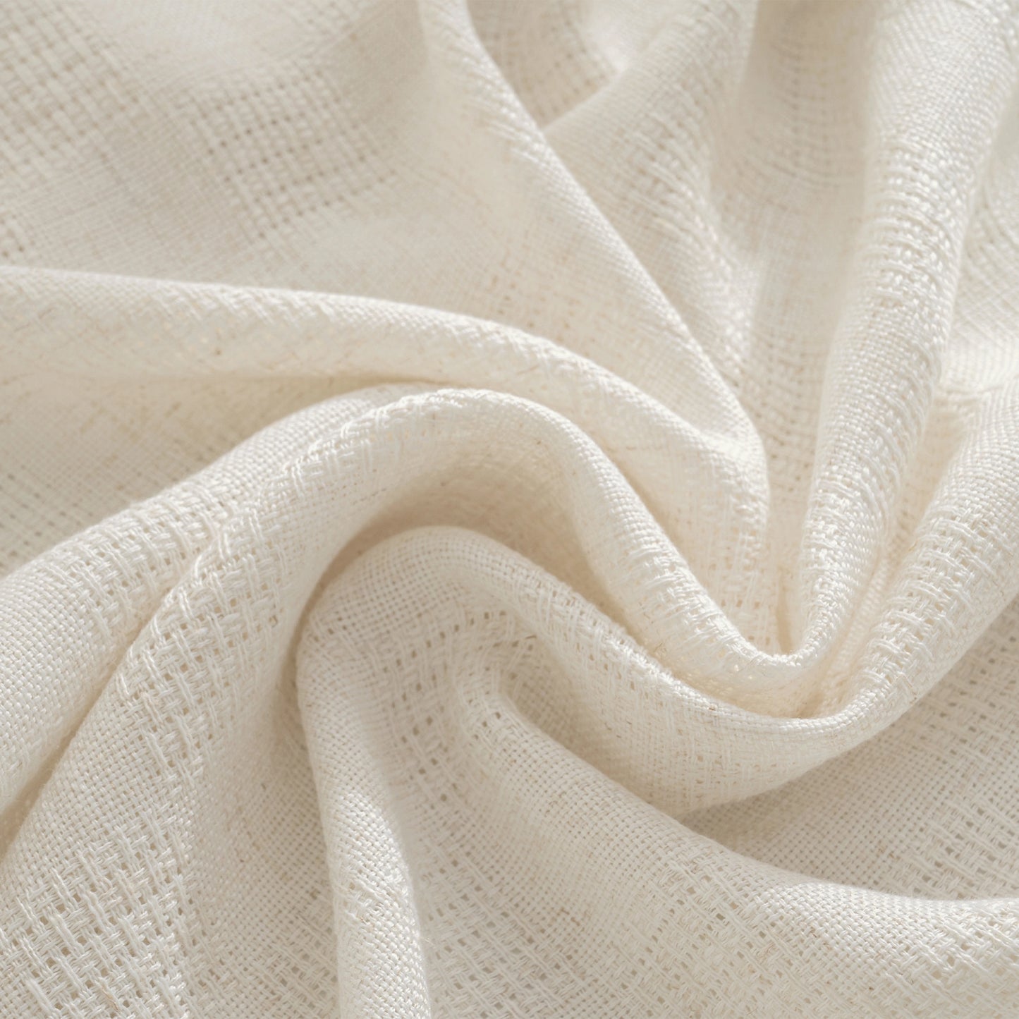 Close up of linen fabric with open weave grid texture showing breathable and lightweight structure