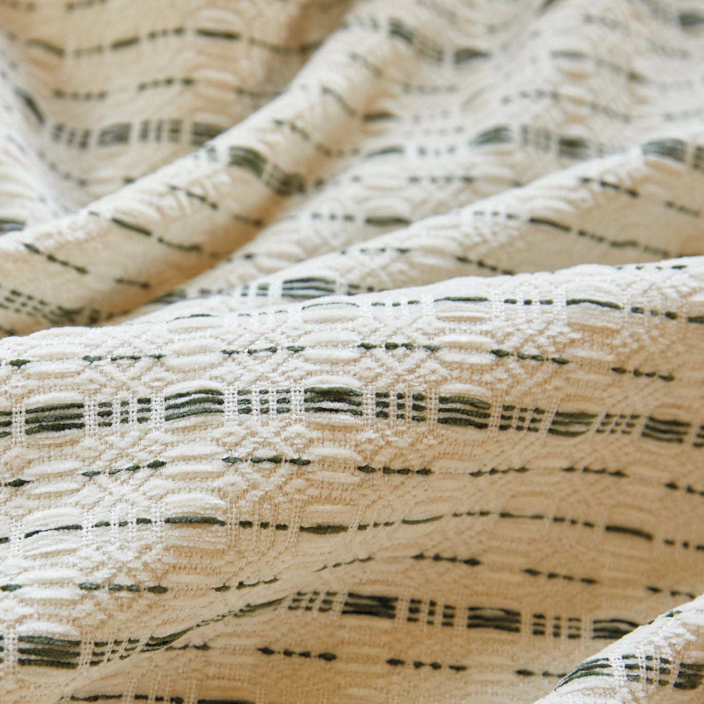 Neutral-beige polyester curtain with modern raised black line pattern.