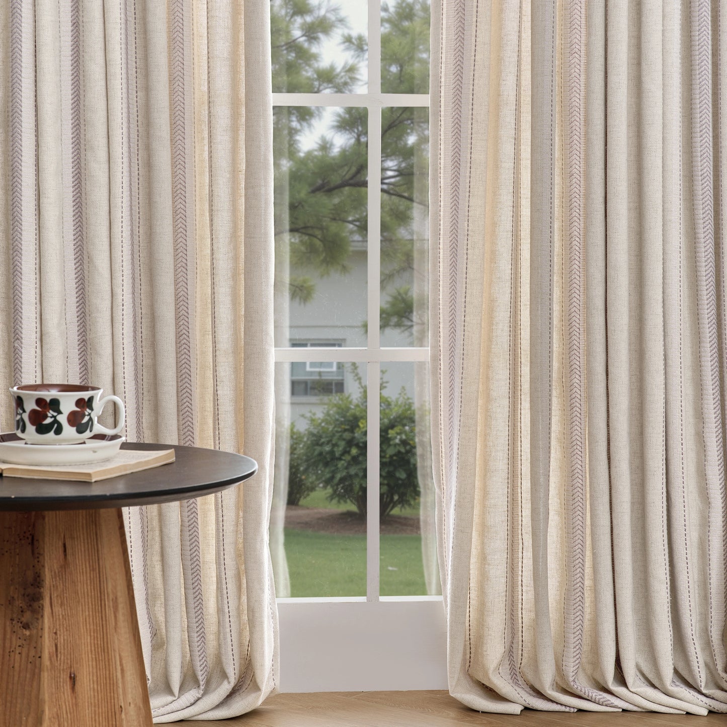 Close-up of oatmeal modern curtain textile in cashmere polyester combination with subtle woven pattern.