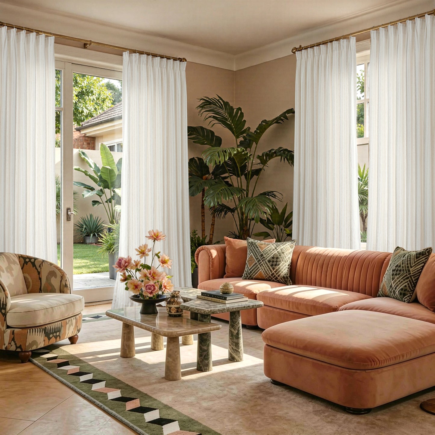 Living room with a brown sectional sofa, armchair, coffee table, and decorative elements.