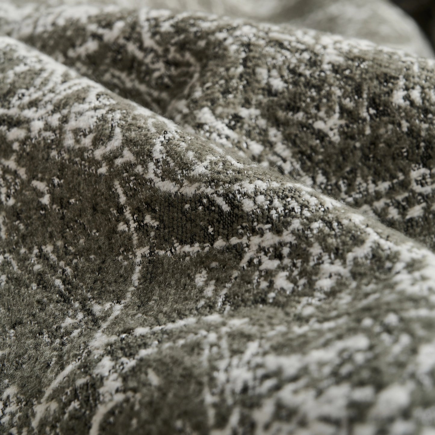 Detailed view of vintage olive curtain showing hand-drawn style motif.